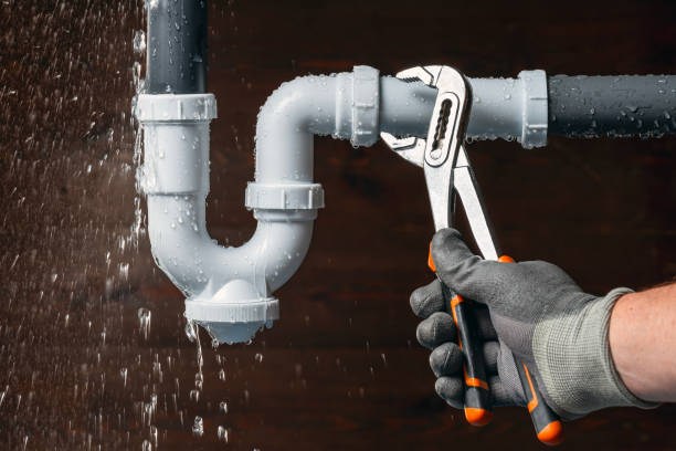 Professional Drain Cleaning technician working in Brookville, IN